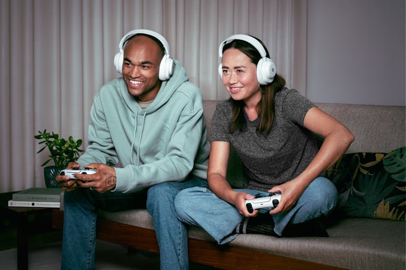 arctis nova 7p white life people indoor living room 03 Steelseries Unveils The Special-edition Arctis Nova 7 White Collection